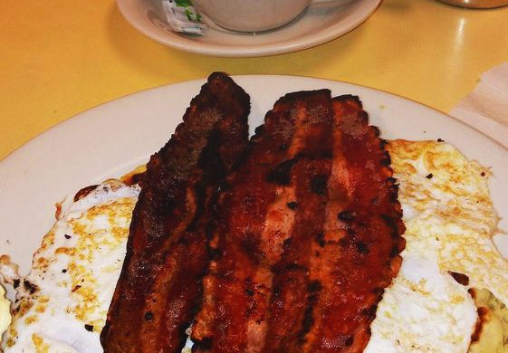 Jersey Shore. This picture he takes one slice of banana pancake topped with three egg whites and turkey bacon on a white platter served on Johnny’s